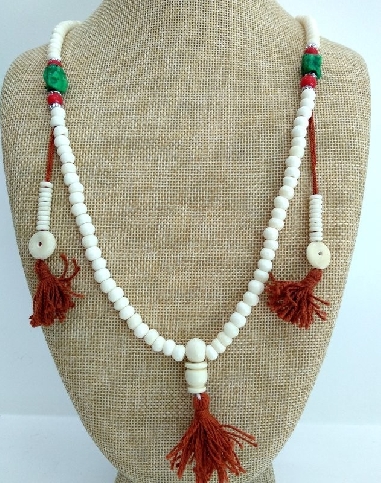 Mala hueso blanco con piedra