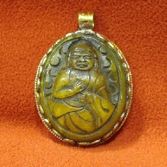 Colgmet170- Buda tallado