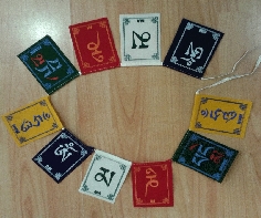 Bandera de oración "Om mane..."