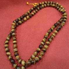 Mala de ojo de tigre grande