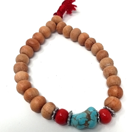 Pulsera palo de rosa natural con turquesa