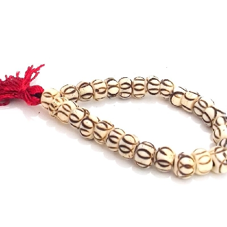 Pulsera de hueso blanco grabado