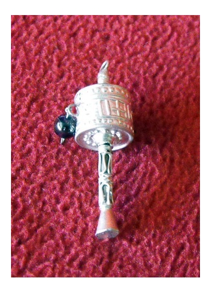 colgante-plata-rueda-oracion