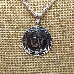 Colgante de plata "Om tibetano"