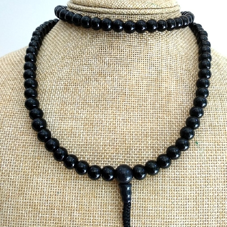 mala-piedra-negro-brillante