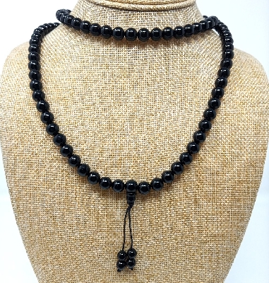 mala-piedra-negro-brillante