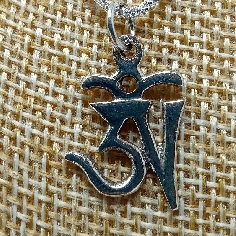 Colgante de plata "Om tibetano"