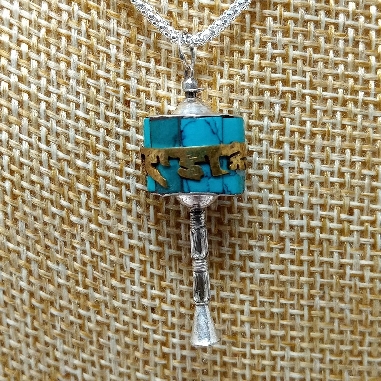 Colgante de plata "Rueda de oración"