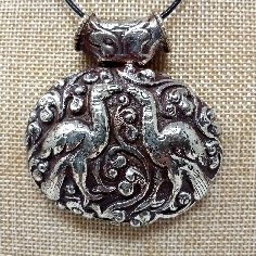 medallón tibetano colgmet250