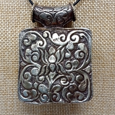 medallón tibetano colgmet249