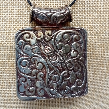 Medallón tibetano colgmet252