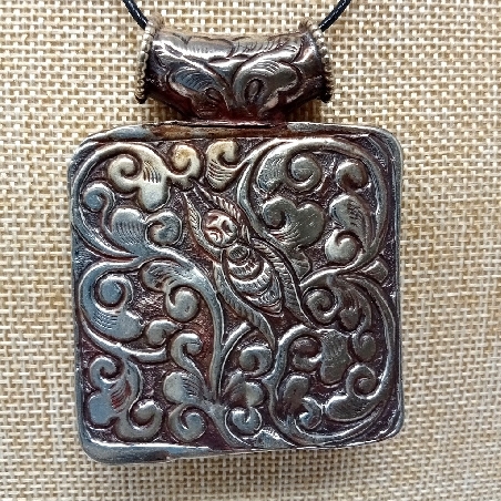 Medallón tibetano colgmet252