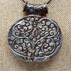medallón tibetano colgmet253 2