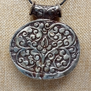 medallón tibetano colgmet253