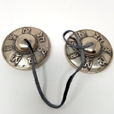 Tingsha bronce calidad "símbolos budistas" 7,5 cms.