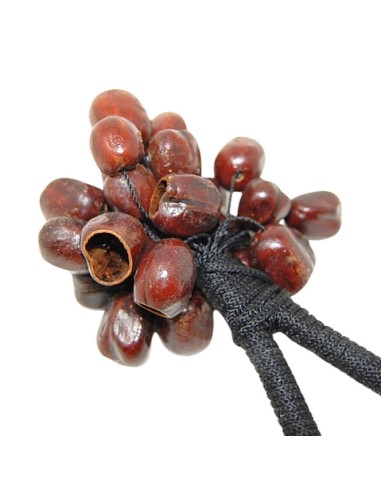 Maraca chamánica de semillas de muñeca